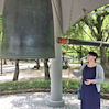  5 Susan ringing the Peace Bell.JPG 